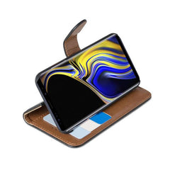 WALLY - Custodia a libro in pelle sintetica con chiusura flap magnetico, slot per carte e funzione stand colore nero compatibile con Samsung Galaxy Note 9